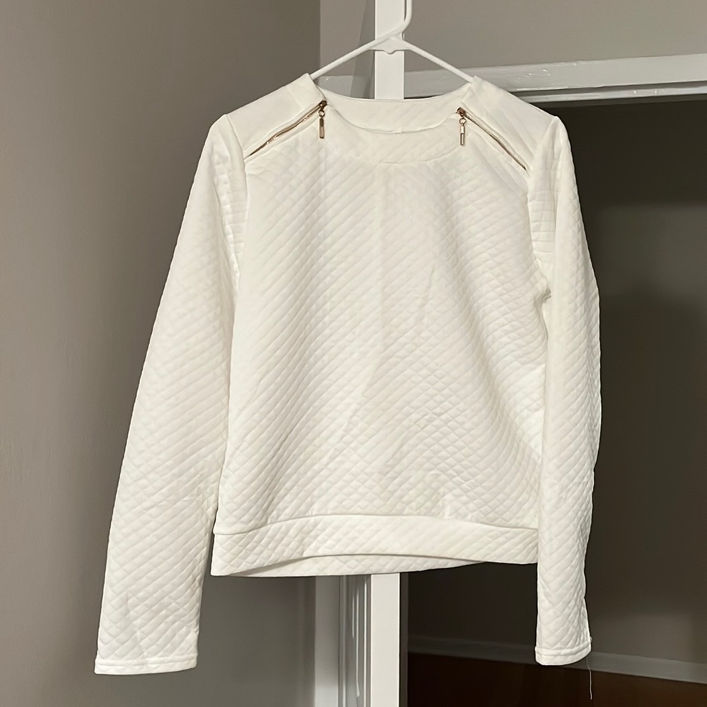 Off white light quilted sweater with gold zipper detail
